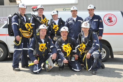 Fraser/Thayer-Lindsley Mine Rescue Team - Front Row (left to right): Dave Lachance (Captain), Luc Lalonde and Pierre Coderre (Vice-Captain) Back row (left to right): Joe Hinrich, Cliff Poirier, Greg Nadeau, Terry Dubois (Briefing Officer) and Dale Kinnonen