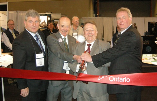 z-(L to R) Chris Hodgson, President of Ontario Mining Association; Jon Baird, PDAC President; Honourable Michael Gravelle, Minister of Northern Development, Mines and Forestry; Garry Clark, Executive Director of the Ontario Prospectors Association