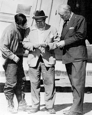 (L to R) Bobby Timmin, Jules Timmins and Iron Ore Company of Canada General Manager William Durrell